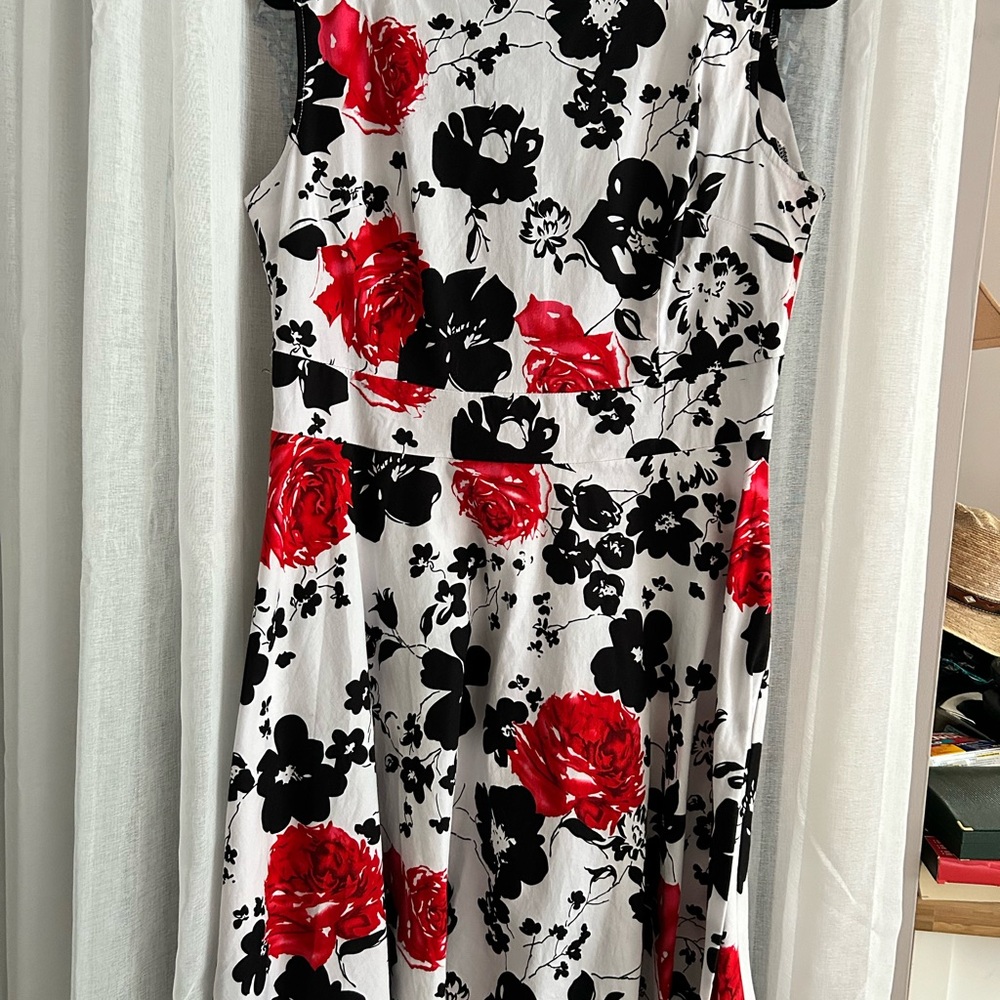 Cute vintage style fit and flare dress with a little stretch.